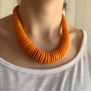 Orange disk necklace